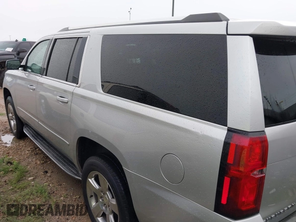 2015 Chevrolet Suburban LTZ with VIN 1GNSCKKC3FR225723, listed as a IAAI auction lot 42577863 with 267,557 mi miles and . Bid and sale history available at DreamBid. Image 3.