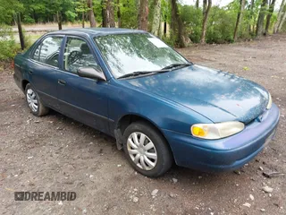 2000 Chevrolet Prizm LSi z VIN 1Y1SK5289YZ401584, wystawiony jako IAAI lot #42263210 z przebiegiem 151 567 mil mil oraz . Historia ofert i sprzedaży dostępna na DreamBid. Obrazek 1.