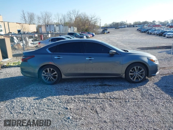 2018 Nissan Altima 2.5 SR with VIN 1N4AL3AP7JC240029, listed as a IAAI auction lot 41883209 with 77,190 mi miles. Bid and sale history available at carsss.com. Image 13.
