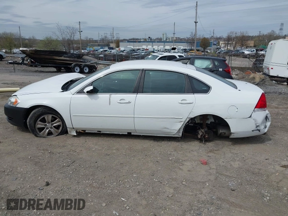 2014 Chevrolet Impala LS with VIN 2G1WA5E38E1141734, listed as a IAAI auction lot 41942551 with 110,805 mi miles and . Bid and sale history available at DreamBid. Image 14.
