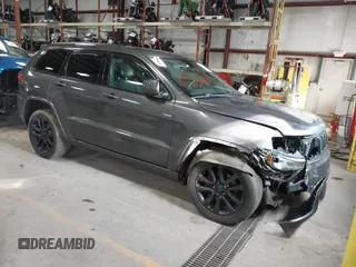 2018 Jeep Grand Cherokee Laredo E with VIN 1C4RJFAG5JC343101, listed as a IAAI auction lot 41211158 with 105,886 mi miles. Bid and sale history available at carsss.com. Image 1.