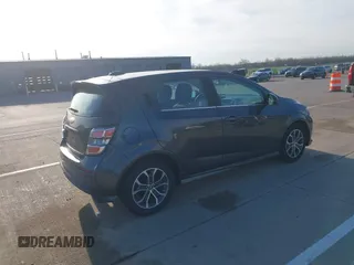 2017 Chevrolet Sonic LT with VIN 1G1JD6SH7H4159111, listed as a IAAI auction lot 41958231 with 125,758 mi miles and . Bid and sale history available at DreamBid. Image 4.
