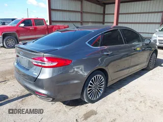 2017 Ford Fusion Titanium with VIN 3FA6P0K98HR124035, listed as a IAAI auction lot 42307936 with Not provided miles and . Bid and sale history available at DreamBid. Image 4.