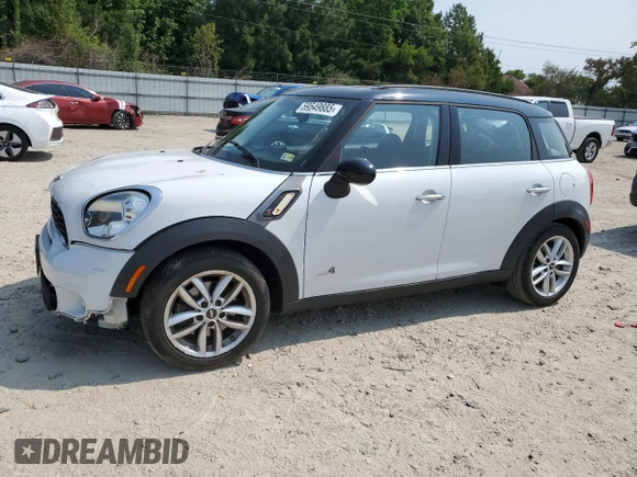 2014 MINI Countryman S with VIN WMWZC5C5XEWP37128, listed as a Copart auction lot 59549885 with 84,121 mi miles and Salvage title. Bid and sale history available at DreamBid. Image 1.