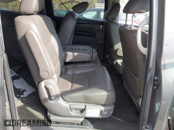 2014 Honda Odyssey Touring with VIN 5FNRL5H92EB073085, listed as a IAAI auction lot 42065913 with 120,834 mi miles and . Bid and sale history available at DreamBid. Image 8.