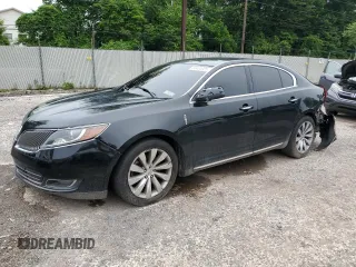 2015 Lincoln MKS with VIN 1LNHL9EK9FG607650, listed as a Copart auction lot 60434925 with 80,466 mi miles and Salvage title. Bid and sale history available at DreamBid. Image 1.