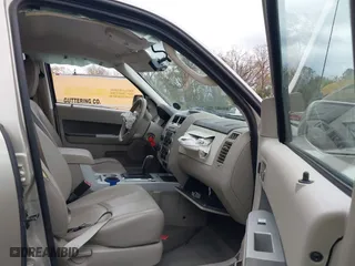 2011 Mercury Mariner Premier with VIN 4M2CN8H78BKJ01173, listed as a IAAI auction lot 40734817 with 67,784 mi miles. Bid and sale history available at carsss.com. Image 5.