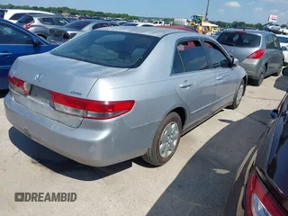 2003 Honda Accord LX with VIN 1HGCM56393A067874, listed as a IAAI auction lot 42390937 with 252,487 mi miles and . Bid and sale history available at DreamBid. Image 4.
