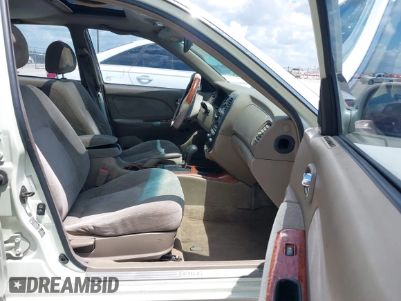 2002 Kia Optima LX z VIN KNAGD126325144218, wystawiony jako IAAI lot #42596691 z przebiegiem 220 972 mil mil oraz . Historia ofert i sprzedaży dostępna na DreamBid. Obrazek 5.