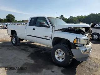 2001 Dodge Ram 2500 with VIN 1B7KF23W01J512727, listed as a Copart auction lot 63804254 with 148,220 mi miles and Salvage Title. Bid and sale history available at carsss.com. Image 4.