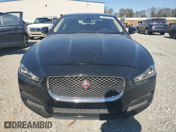 2017 Jaguar XE with VIN SAJAJ4BNXHCP11556, listed as a Copart auction lot 75807284 with 31,040 mi miles and Salvage Title. Bid and sale history available at DreamBid. Image 5.