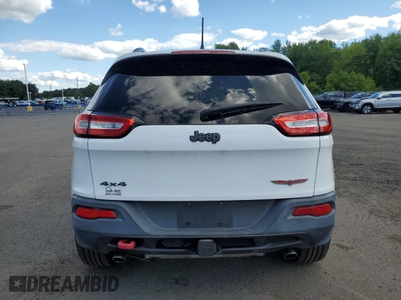 2014 Jeep Cherokee Trailhawk with VIN 1C4PJMBS5EW111360, listed as a Copart auction lot 65607975 with 139,642 mi miles and Clean title. Bid and sale history available at DreamBid. Image 6.