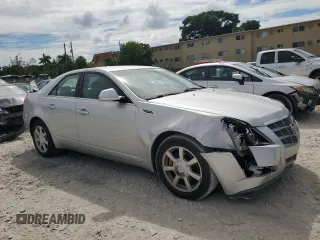 2009 Cadillac CTS RWD w/1SA with VIN 1G6DF577690145964, listed as a Copart auction lot 74073064 with 103,788 mi miles and Salvage Title. Bid and sale history available at carsss.com. Image 4.