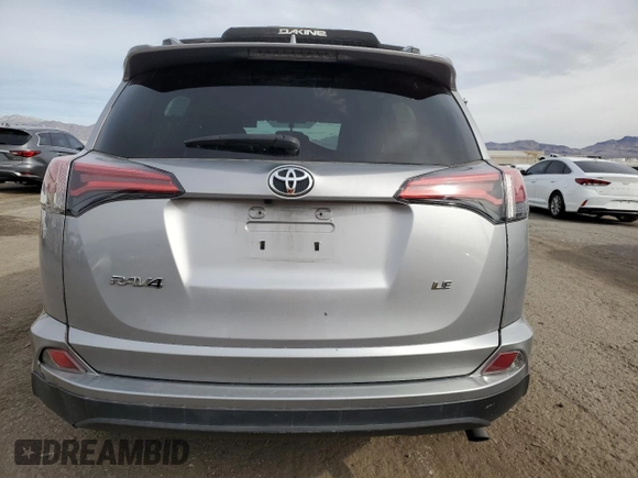 2016 Toyota RAV4 LE with VIN 2T3ZFREVXGW285018, listed as a Copart auction lot 49267575 with 77,832 mi miles and Salvage Title. Bid and sale history available at DreamBid. Image 6.