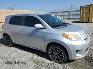 2010 Scion xD with VIN JTKKU4B40A1005613, listed as a Copart auction lot 56074605 with 205,505 mi miles and Clean Title. Bid and sale history available at DreamBid. Image 4.