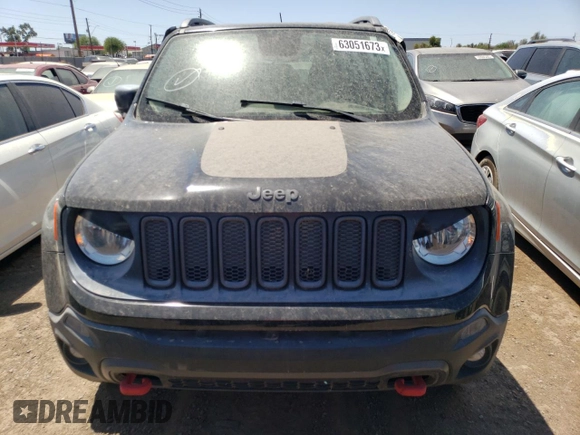 2015 Jeep Renegade Trailhawk z VIN ZACCJBCT9FPB21561, wystawiony jako Copart lot #63051673 z przebiegiem Nie podano mil oraz Szkoda całkowita • Salvage title. Historia ofert i sprzedaży dostępna na DreamBid. Obrazek 5.