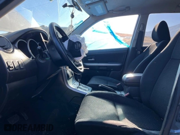 2006 Suzuki Grand Vitara Premium with VIN JS3TD943964102832, listed as a Copart auction lot 59971694 with 148,329 mi miles and Salvage title. Bid and sale history available at DreamBid. Image 7.