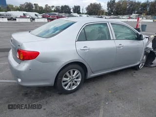 2010 Toyota Corolla with VIN 1NXBU4EE4AZ179951, listed as a IAAI auction lot 42136926 with 148,383 mi miles. Bid and sale history available at carsss.com. Image 4.