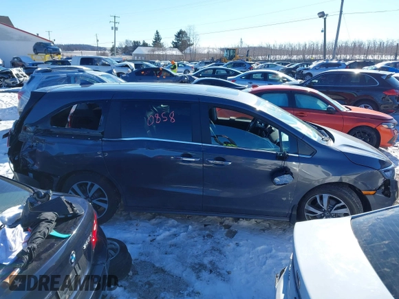 2023 Honda Odyssey Touring with VIN 5FNRL6H80PB005769, listed as a IAAI auction lot 41280858 with 7,041 mi miles and . Bid and sale history available at DreamBid. Image 13.