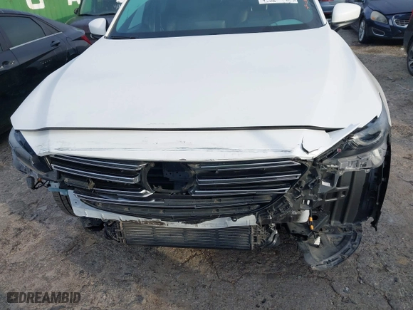 2016 Mazda CX-9 Grand Touring with VIN JM3TCBDY3G0116309, listed as a IAAI auction lot 40890199 with 64,948 mi miles. Bid and sale history available at carsss.com. Image 13.