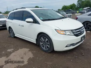 2015 Honda Odyssey Touring Elite with VIN 5FNRL5H91FB063360, listed as a IAAI auction lot 42645578 with 187,262 mi miles and . Bid and sale history available at DreamBid. Image 1.