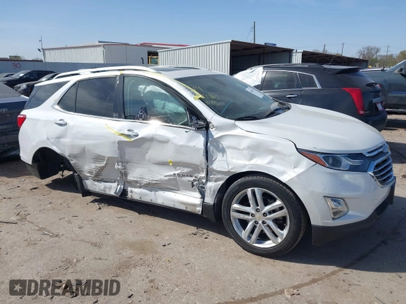 2018 Chevrolet Equinox Premier with VIN 2GNAXWEX3J6141427, listed as a IAAI auction lot 41830179 with 76,707 mi miles and . Bid and sale history available at carsss.com. Image 1.