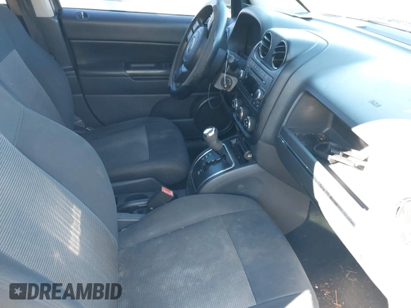 2011 Jeep Compass with VIN 1J4NT1FB8BD248904, listed as a IAAI auction lot 41667133 with 212,887 mi miles. Bid and sale history available at carsss.com. Image 5.