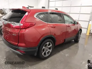 2018 Honda CR-V EX with VIN 2HKRW2H55JH661562, listed as a IAAI auction lot 41925429 with 112,575 mi miles and . Bid and sale history available at DreamBid. Image 4.