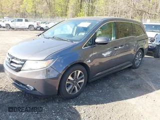 2015 Honda Odyssey Touring Elite with VIN 5FNRL5H99FB094727, listed as a IAAI auction lot 42001288 with 254,015 mi miles and . Bid and sale history available at DreamBid. Image 2.