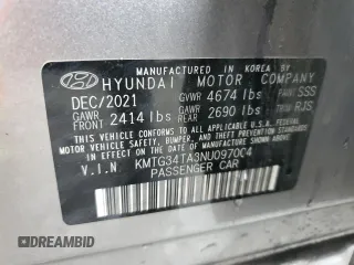 2022 Genesis G70 2.0T z VIN KMTG34TA3NU097004, wystawiony jako Copart lot #45057595 z przebiegiem 39 080 mil mil oraz Szkoda całkowita • Salvage title. Historia ofert i sprzedaży dostępna na DreamBid. Obrazek 13.