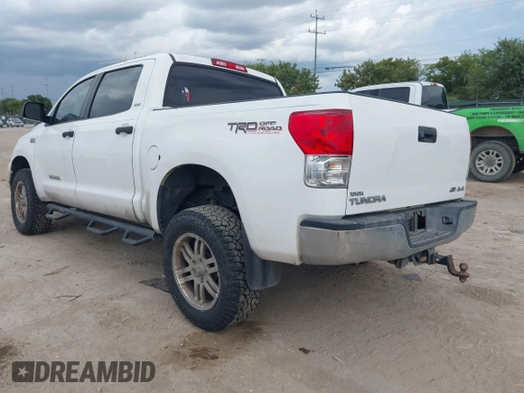 2012 Toyota Tundra 4WD Truck with VIN 5TFDW5F19CX250264, listed as a IAAI auction lot 40190175 with 267,549 mi miles. Bid and sale history available at carsss.com. Image 3.