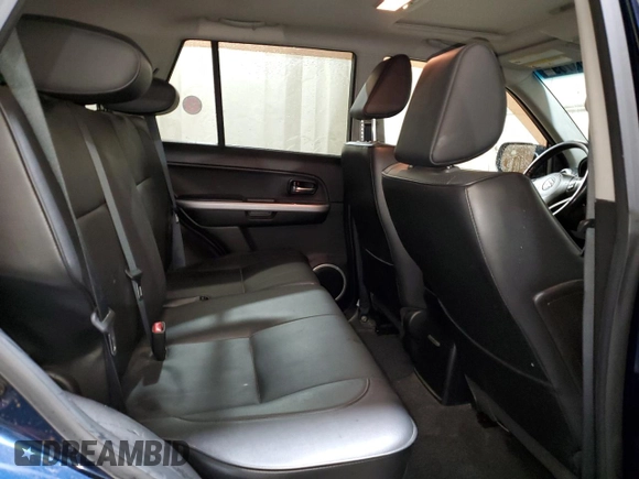 2012 Suzuki Grand Vitara Limited z VIN JS3TD0D77C4101382, wystawiony jako Copart lot #60017895 z przebiegiem 118 024 mil mil oraz Szkoda całkowita • Salvage title. Historia ofert i sprzedaży dostępna na DreamBid. Obrazek 11.