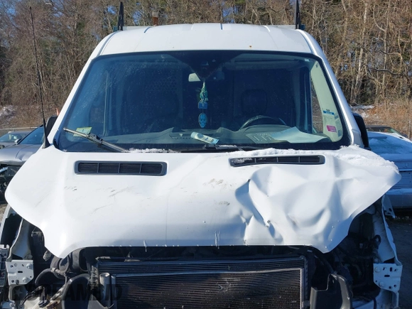 2016 Ford Transit Cargo with VIN 1FTYR1CM7GKA48493, listed as a IAAI auction lot 41363457 with 184,305 mi miles and . Bid and sale history available at DreamBid. Image 12.