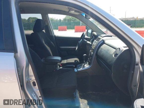 2012 Suzuki Grand Vitara Premium with VIN JS3TD0D29C4100982, listed as a IAAI auction lot 42645440 with 181,033 mi miles and . Bid and sale history available at DreamBid. Image 5.