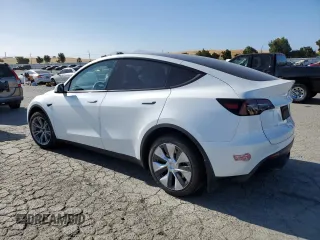 2024 Tesla Model Y Long Range с VIN 7SAYGDEE8RF983067, выставлен на аукционе Copart как лот 61217015 с пробегом 57 082 миль миль и Списание • Salvage title. История ставок и продаж доступна на DreamBid. Изображение 2.