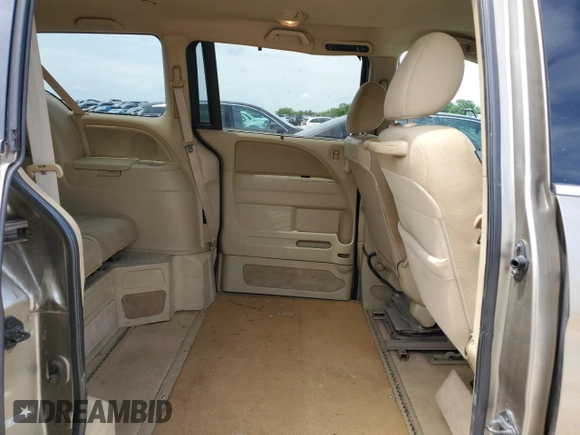 2010 Honda Odyssey EX z VIN 5FNRL3H47AB005755, wystawiony jako Copart lot #59584305 z przebiegiem 90 338 mil mil oraz Szkoda całkowita • Salvage title. Historia ofert i sprzedaży dostępna na DreamBid. Obrazek 11.