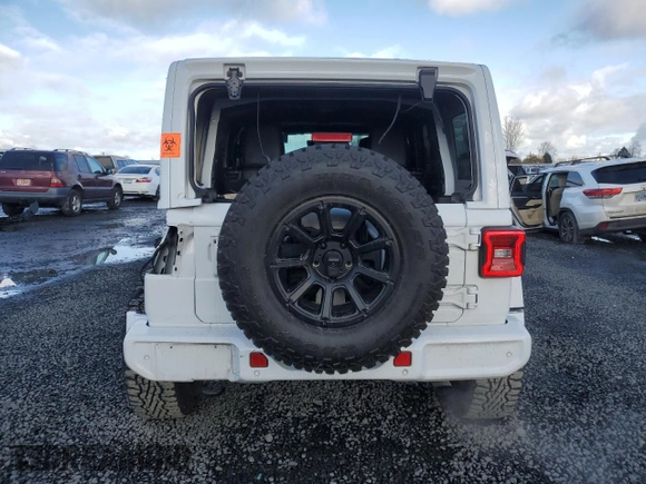 2020 Jeep Wrangler Unlimited Sahara Altitude z VIN 1C4HJXEG2LW319304, wystawiony jako Copart lot #88274015 z przebiegiem 50 599 mil mil oraz Szkoda całkowita • Salvage title. Historia ofert i sprzedaży dostępna na DreamBid. Obrazek 6.