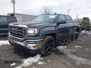 2017 GMC Sierra 1500 SLE with VIN 3GTU2MEC6HG319366, listed as a IAAI auction lot 41351311 with 123,097 mi miles and . Bid and sale history available at DreamBid. Image 2.