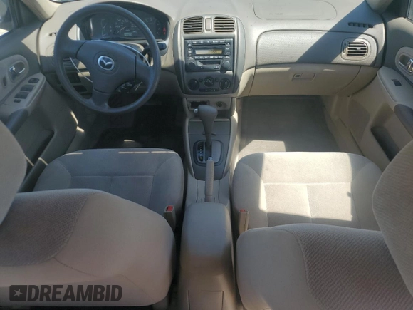2002 Mazda Protege DX with VIN JM1BJ225121567924, listed as a Copart auction lot 54847545 with 93,653 mi miles and Salvage Title. Bid and sale history available at DreamBid. Image 8.