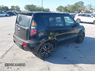 2011 Kia Soul + with VIN KNDJT2A22B7282062, listed as a IAAI auction lot 42035564 with 201,870 mi miles. Bid and sale history available at carsss.com. Image 4.