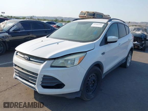 2016 Ford Escape SE z VIN 1FMCU0GXXGUC13444, wystawiony jako IAAI lot #39566364 z przebiegiem 162 059 mil mil oraz . Historia ofert i sprzedaży dostępna na DreamBid. Obrazek 2.
