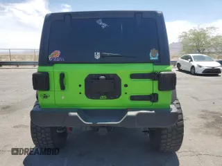 2018 Jeep Wrangler Unlimited Sport with VIN 1C4HJXDG7JW115516, listed as a Copart auction lot 58231735 with 52,992 mi miles and Salvage title. Bid and sale history available at DreamBid. Image 6.
