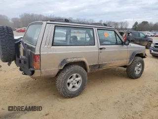 1993 Jeep Cherokee Sport with VIN 1J4FJ67S6PL580133, listed as a Copart auction lot 43230005 with 122,173 mi miles and Salvage Title. Bid and sale history available at carsss.com. Image 3.