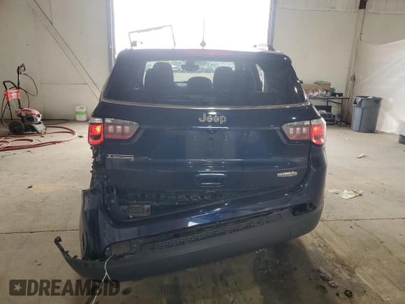 2018 Jeep Compass Latitude z VIN 3C4NJCBB6JT265612, wystawiony jako Copart lot #56628905 z przebiegiem 108 592 mil mil oraz Szkoda całkowita • Salvage title. Historia ofert i sprzedaży dostępna na DreamBid. Obrazek 6.