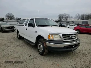 2001 Ford F-150 XL with VIN 1FTRX17L51NB25752, listed as a Copart auction lot 48721235 with 179,941 mi miles and Salvage title. Bid and sale history available at DreamBid. Image 11.