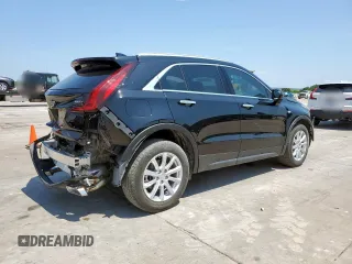 2023 Cadillac XT4 FWD Luxury z VIN 1GYAZAR42PF102696, wystawiony jako Copart lot #60524065 z przebiegiem 1 903 mil mil oraz Szkoda całkowita • Salvage title. Historia ofert i sprzedaży dostępna na DreamBid. Obrazek 3.