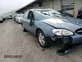 2000 Ford Taurus SEL with VIN 1FAFP56S2YG160062, listed as a Copart auction lot 82297744 with 97,218 mi miles and Salvage title. Bid and sale history available at DreamBid. Image 11.