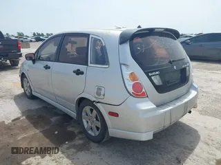 2006 Suzuki Aerio Premium z VIN JS2RC62H565354215, wystawiony jako IAAI lot #42256918 z przebiegiem 165 519 mil mil oraz . Historia ofert i sprzedaży dostępna na DreamBid. Obrazek 3.