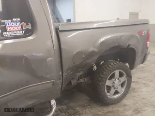 2013 GMC Sierra 2500HD SLE with VIN 1GT220C83DZ251178, listed as a IAAI auction lot 41342465 with 138,134 mi miles. Bid and sale history available at carsss.com. Image 6.