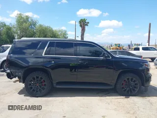 2018 Chevrolet Tahoe LS with VIN 1GNSCAKC9JR183853, listed as a IAAI auction lot 42254267 with 87,351 mi miles and . Bid and sale history available at DreamBid. Image 13.